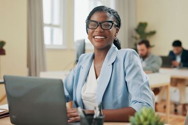 Smile, laptop and glasses with business woman in office...