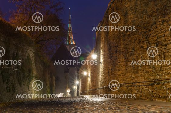 Pikk Jalg street illuminated by night, Tallinn, Estonia