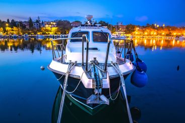 Boat in harbor dusk view, Island of Krk
