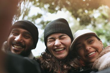 Friends, selfie and hiking adventure in nature together,...