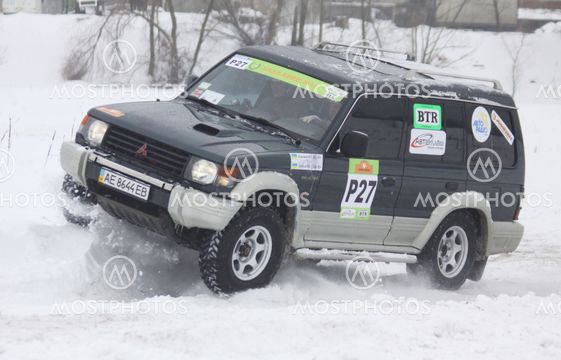 Ukraine Racing Team's crew rides over snow track