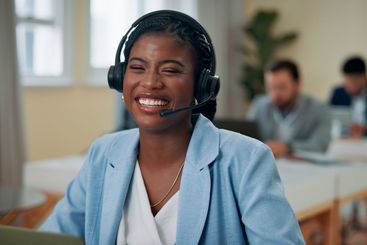 Office, businesswoman and happy with laptop for headset,...