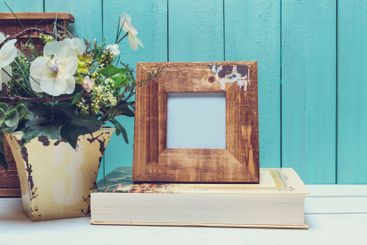 Shabby chic style home decorations on wooden background