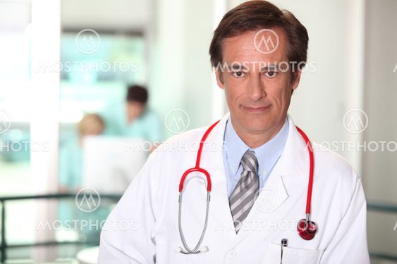 Doctor in a white coat and stethoscope