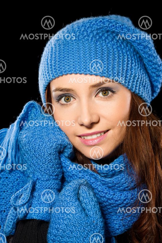 Young happy woman wearing winter cloth