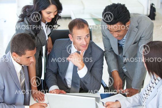 Multi-ethnic business people working together in a project